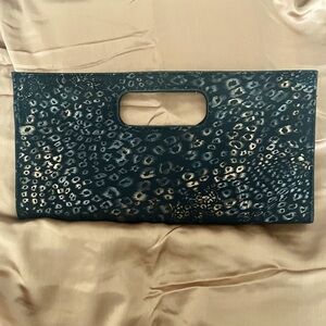 Giannini black with metallic flecks clutch